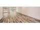 Bright living room with wood-look flooring and plenty of natural light at 2459 Cedar Canyon Se Ct, Marietta, GA 30067