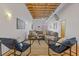 Comfortable living room with a cozy sectional sofa and exposed ceiling at 1846 Liberty Ln, Roswell, GA 30075