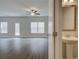 Bathroom sink, vanity, and mirror lead into brightly lit living area at 4544 Eastbrook Pl, Snellville, GA 30039