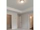 Bedroom with crown molding featuring neutral walls and carpet and two entry doors at 4544 Eastbrook Pl, Snellville, GA 30039