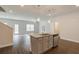 Contemporary kitchen with granite island, stainless steel appliances, and open layout, ideal for Gathering gatherings and cooking at 4544 Eastbrook Pl, Snellville, GA 30039