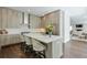 Well-appointed kitchen with a large island, stainless steel appliances, and bar stool seating at 6596 Aria Village Dr # 642, Atlanta, GA 30328