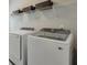 Bright laundry room with modern washer and dryer at 6596 Aria Village Dr # 642, Atlanta, GA 30328