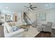 Open living room with hardwood floors and comfortable seating, ideal for entertaining at 6596 Aria Village Dr # 642, Atlanta, GA 30328