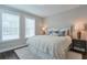 Bright main bedroom featuring hardwood floors, neutral walls, and great natural light at 6596 Aria Village Dr # 642, Atlanta, GA 30328