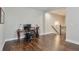 Bright home office space featuring hardwood floors, a desk, and a comfortable chair at 6596 Aria Village Dr # 642, Atlanta, GA 30328