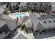 Aerial view of community pool and surrounding neighborhood properties at 6739 Encore Blvd, Atlanta, GA 30328