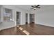 Spacious bedroom with hardwood floors and access to an en-suite bathroom and walk-in closet at 6739 Encore Blvd, Atlanta, GA 30328