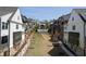 View of neighborhood properties and lavish central green space between homes at 6739 Encore Blvd, Atlanta, GA 30328