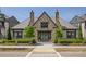 Charming stone clubhouse exterior with a symmetrical design, manicured landscaping, and inviting entrance at 6739 Encore Blvd, Atlanta, GA 30328