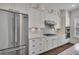 Chef's kitchen featuring stainless steel appliances, custom cabinets, and granite countertops at 6739 Encore Blvd, Atlanta, GA 30328