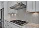 Close-up of a gourmet kitchen featuring stainless steel appliances and stone countertops at 6739 Encore Blvd, Atlanta, GA 30328
