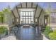 Elegant clubhouse lounge with high ceilings, large windows, and stylish contemporary furniture at 6739 Encore Blvd, Atlanta, GA 30328