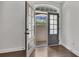 Bright office area with hardwood floors and french doors leading to outdoor space at 6739 Encore Blvd, Atlanta, GA 30328