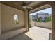 Covered brick patio with built-in seating offers a serene outdoor retreat at 6739 Encore Blvd, Atlanta, GA 30328