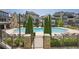Resort-style pool with surrounding lounge area and mature landscaping for a relaxing community feel at 6739 Encore Blvd, Atlanta, GA 30328