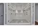 This bathroom features a luxurious glass-enclosed shower with dual shower heads and striking tile accents at 6739 Encore Blvd, Atlanta, GA 30328