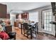 Dining area with kitchen view, completed with table and four chairs at 9224 Snipe Ln, Jonesboro, GA 30236