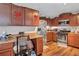 Features updated appliances, wooden cabinets, and granite countertops at 9224 Snipe Ln, Jonesboro, GA 30236