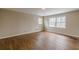 Spacious bedroom with hardwood floors and natural light at 3390 Somerset Sw Trl, Atlanta, GA 30331