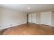 Bedroom featuring hardwood floors and large closet at 3390 Somerset Sw Trl, Atlanta, GA 30331