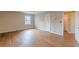 Bedroom with hardwood floors, large windows and closet with entry to hall at 3390 Somerset Sw Trl, Atlanta, GA 30331