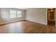 Bright bedroom with hardwood floors and large window at 3390 Somerset Sw Trl, Atlanta, GA 30331