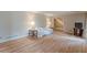 Spacious living room featuring hardwood floors and a view of the staircase in the entryway at 3390 Somerset Sw Trl, Atlanta, GA 30331