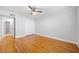 A bright bedroom offers hardwood floors, closet, and fresh, neutral paint at 48 Peachtree Ne Ave # 412, Atlanta, GA 30305