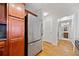 Kitchen with stainless steel refrigerator and wood cabinets at 48 Peachtree Ne Ave # 412, Atlanta, GA 30305