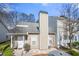 Charming townhome with a well-maintained front yard, white door, and neutral siding at 6450 Wellington Chase Ct, Lithonia, GA 30058