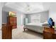 Spacious bedroom with tray ceiling, large windows, and ample natural light at 174 Whetstone Way, Villa Rica, GA 30180