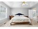 Spacious bedroom with tray ceiling, large windows, and ample natural light at 174 Whetstone Way, Villa Rica, GA 30180