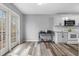 Modern kitchen with sleek countertops, stainless steel appliances, and a door to the deck at 174 Whetstone Way, Villa Rica, GA 30180