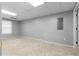 Finished basement room with carpet and recessed ceiling lights at 174 Whetstone Way, Villa Rica, GA 30180