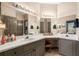 Spacious bathroom featuring double sinks, ample counter space, and great lighting at 407 The Crossings Ln, Woodstock, GA 30189