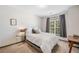 Comfortable bedroom with natural light and neutral décor at 407 The Crossings Ln, Woodstock, GA 30189