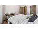 A bright bedroom with a desk and lots of pillows on the bed at 407 The Crossings Ln, Woodstock, GA 30189
