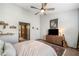A comfy main bedroom with an open en-suite bathroom at 407 The Crossings Ln, Woodstock, GA 30189
