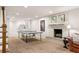 Basement including ping pong, a fireplace, and plenty of space for entertainment and recreation at 4183 Paran Pines Nw Dr, Atlanta, GA 30327