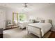 Bright bedroom with two beds, and a serene atmosphere, perfect for restful nights and peaceful mornings at 4183 Paran Pines Nw Dr, Atlanta, GA 30327