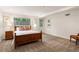 Bedroom with wood accents, carpet, and natural light at 4183 Paran Pines Nw Dr, Atlanta, GA 30327