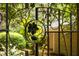 Intricate iron gate surrounded by lush greenery at 4183 Paran Pines Nw Dr, Atlanta, GA 30327