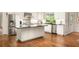 Modern kitchen featuring stainless steel appliances, a central island, and white cabinets at 4183 Paran Pines Nw Dr, Atlanta, GA 30327