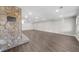Finished basement featuring modern flooring, neutral walls, and recessed lighting at 6313 Shoreland Cir, Buford, GA 30518