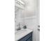 Elegant bathroom with modern sink, vanity and decor at 6313 Shoreland Cir, Buford, GA 30518