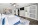 Comfortable bedroom features a closet and an ensuite bathroom with updated finishes at 6313 Shoreland Cir, Buford, GA 30518
