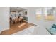 Open living area featuring kitchen, dining area, and bright, natural light at 1436 Maston Rd, Auburn, GA 30011