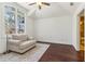 Bright bedroom featuring large windows and a comfortable seating area at 2148 Vicki Ln, Cumming, GA 30041