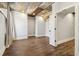 Charming bedroom featuring a decorative metal ceiling and hardwood floors throughout at 2148 Vicki Ln, Cumming, GA 30041